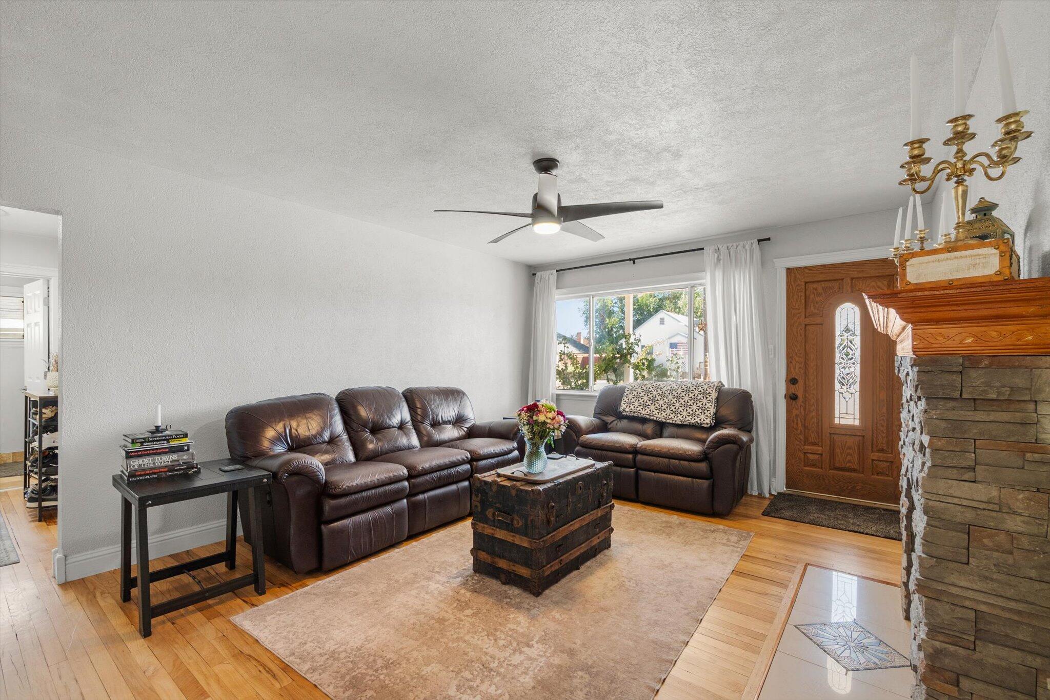1514 Walbridge Street Red Bluff, CA 96080 - Photo 7 of 36 a living room with furniture and a fireplace