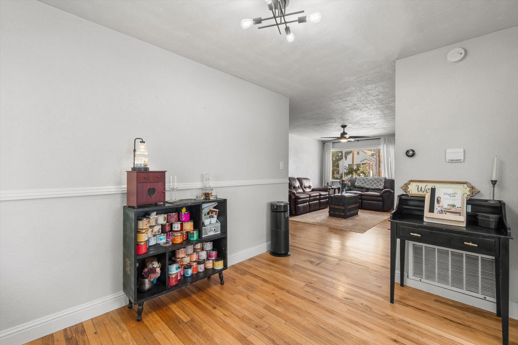 1514 Walbridge Street Red Bluff, CA 96080 - Photo 10 of 36 a living room with furniture and a wooden floor