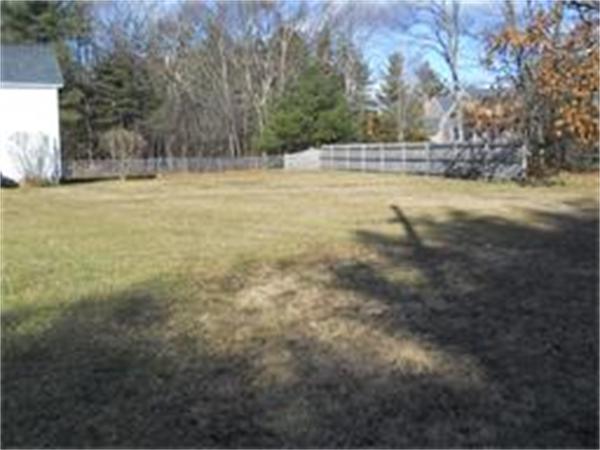 156 Ayer Road Shirley, MA 01464 - Photo 9 of 10 a view of a field with trees in the background