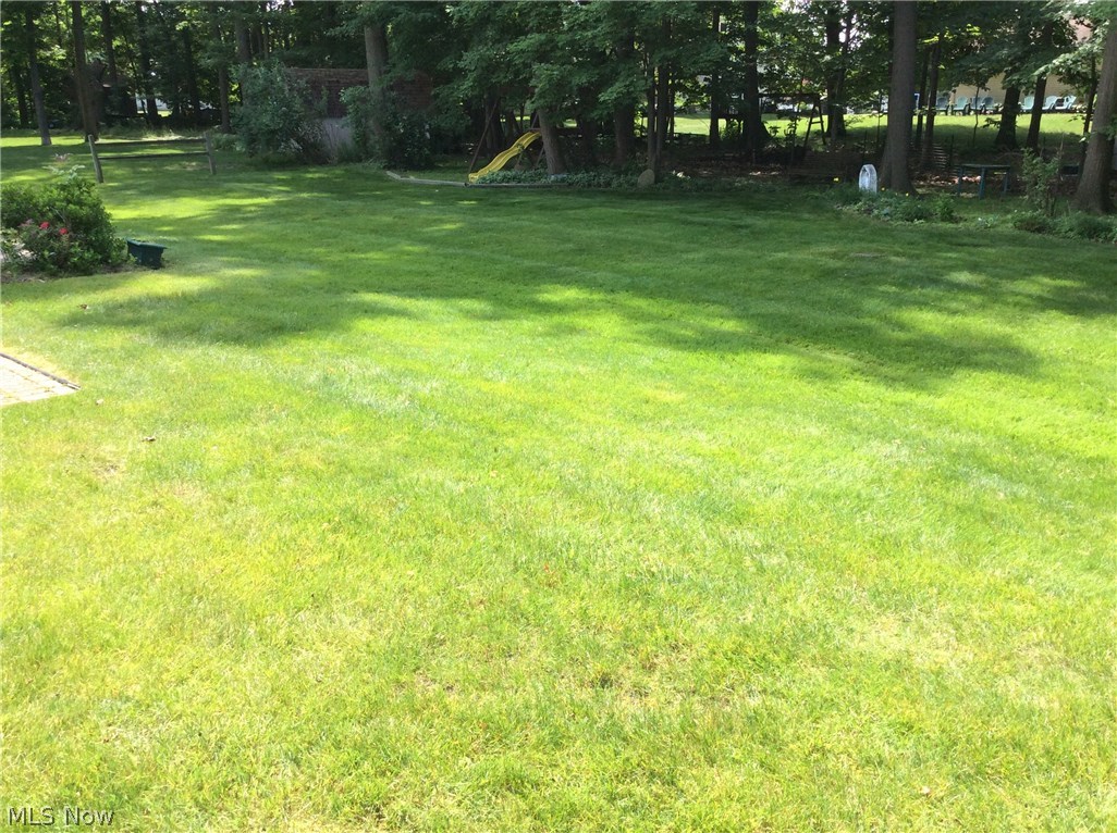188 Ledge Road Macedonia, OH 44056 - Photo 21 of 23 RELAX & ENJOY THE BEAUTIFULLY LANDSCAPED BACKYARD WHICH INCLUDES ORNAMENTAL TREES, SHRUBS & PERENNIALS.