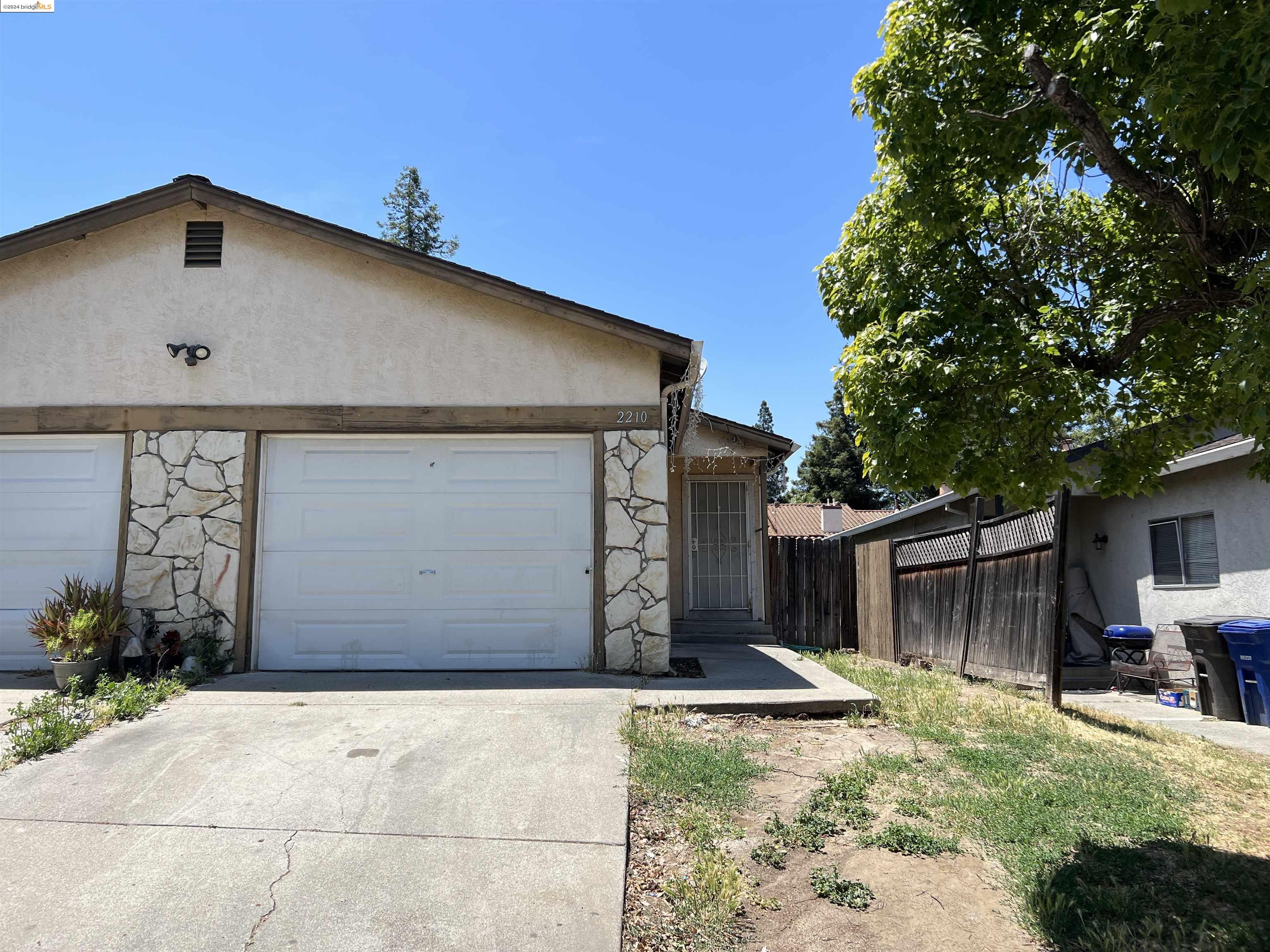 Pittsburg Pittsburg, CA 94565 - Photo 1 of 4 a front view of a house with garden