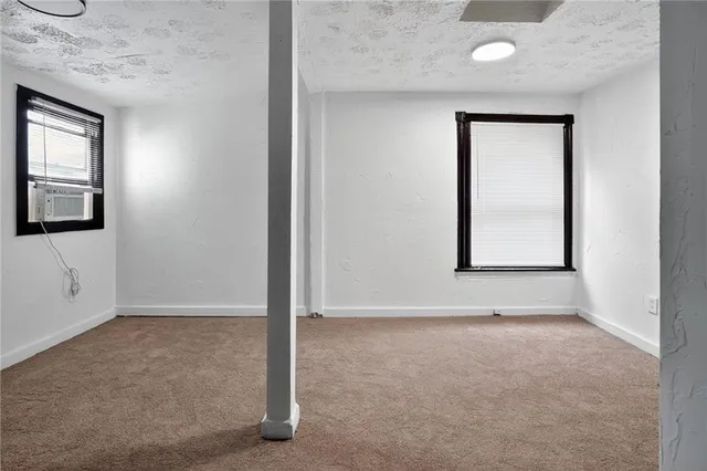 an empty room with windows