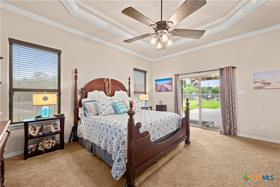 2649 Bowles Ranch Road Belton, TX 76513 - Photo 15 of 36 a bed sitting in a bedroom next to a window