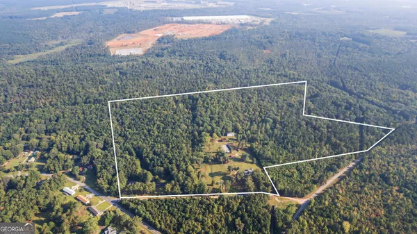 a view of a yard with trees