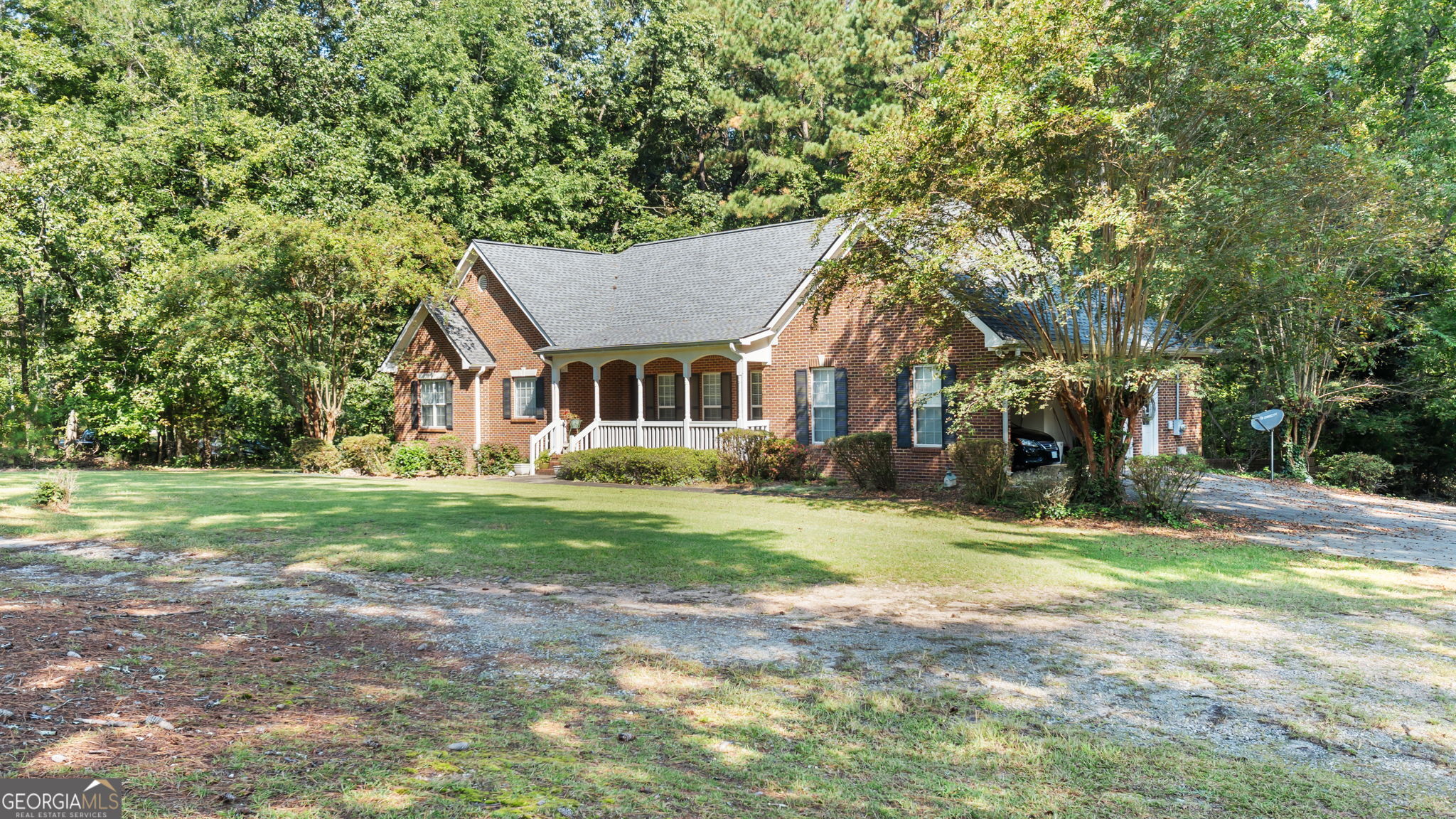 2987 Steele Road Griffin, GA 30223 - Photo 19 of 22 a view of a house with a yard