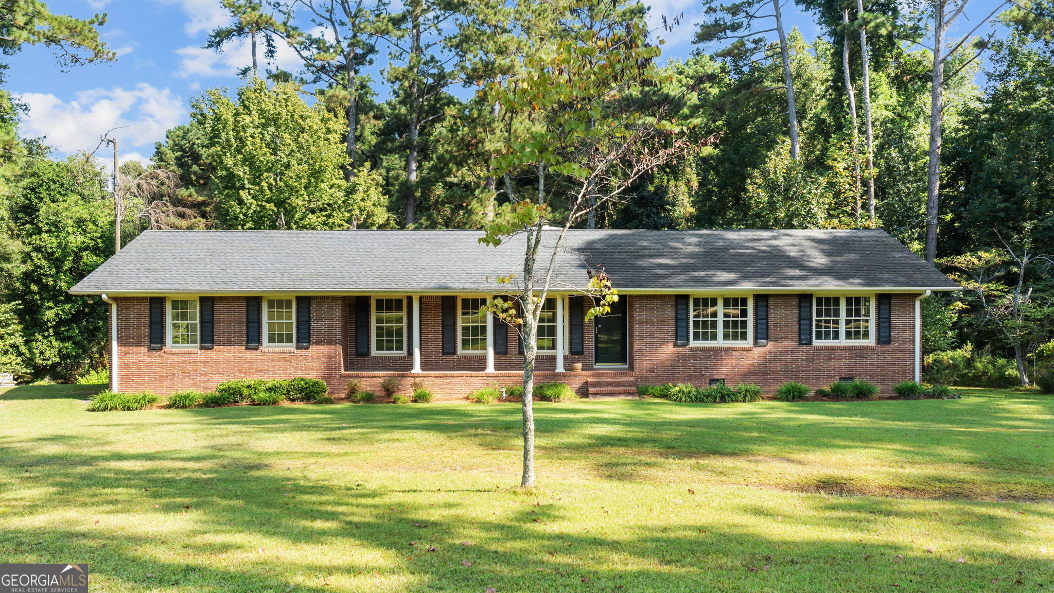 2987 Steele Road Griffin, GA 30223 - Photo 5 of 22 a view of a house with a yard and sitting area