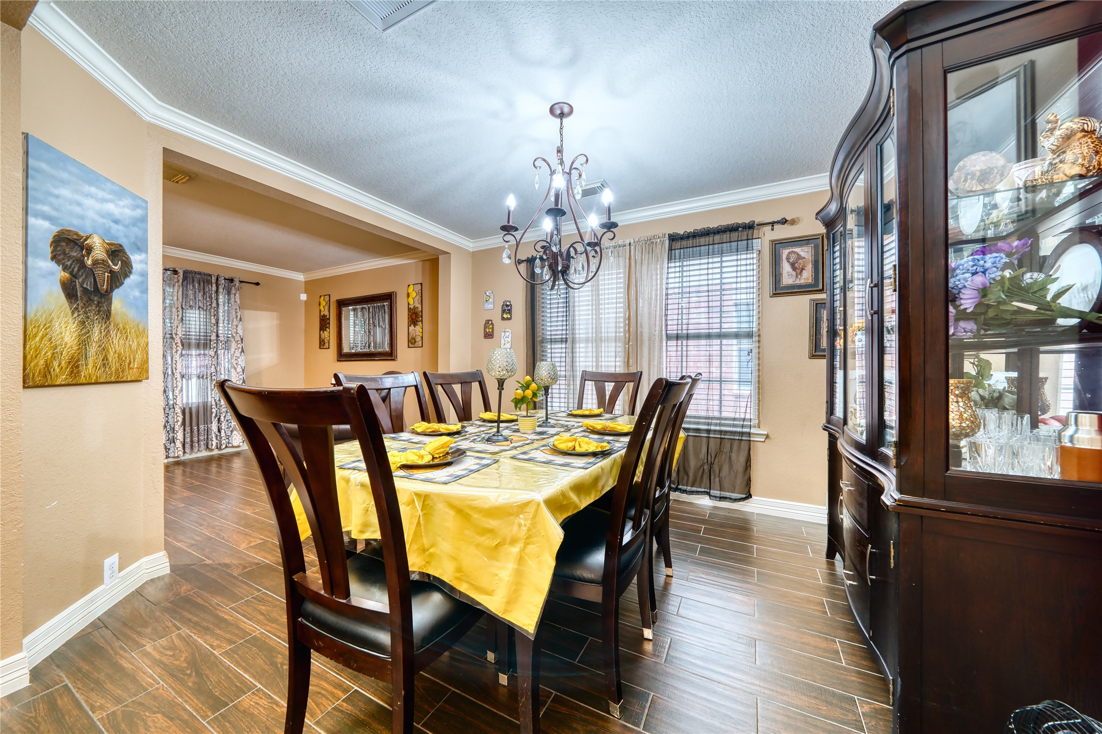 2210 Mountain Ranch Drive Houston, TX 77049 - Photo 12 of 36 a view of a dining room with furniture and wooden floor