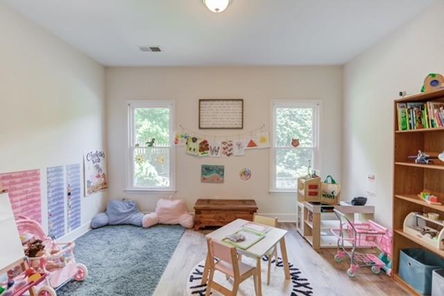 1727 Bakers Mill Road Dacula, GA 30019 - Photo 14 of 39 a living room with furniture and a window