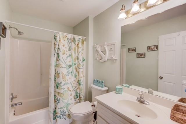 1727 Bakers Mill Road Dacula, GA 30019 - Photo 22 of 39 a bathroom with a sink a toilet and shower