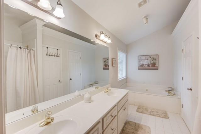 1727 Bakers Mill Road Dacula, GA 30019 - Photo 27 of 39 a en suite bathroom with a double vanity sink and a mirror