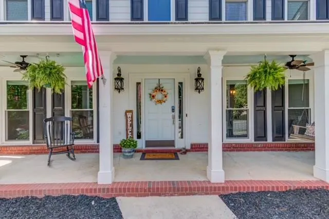 a view of a entryway door front of house