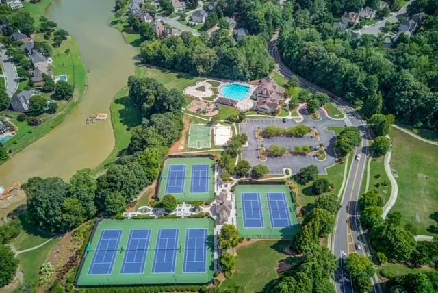 a view of an outdoor space and tennis court