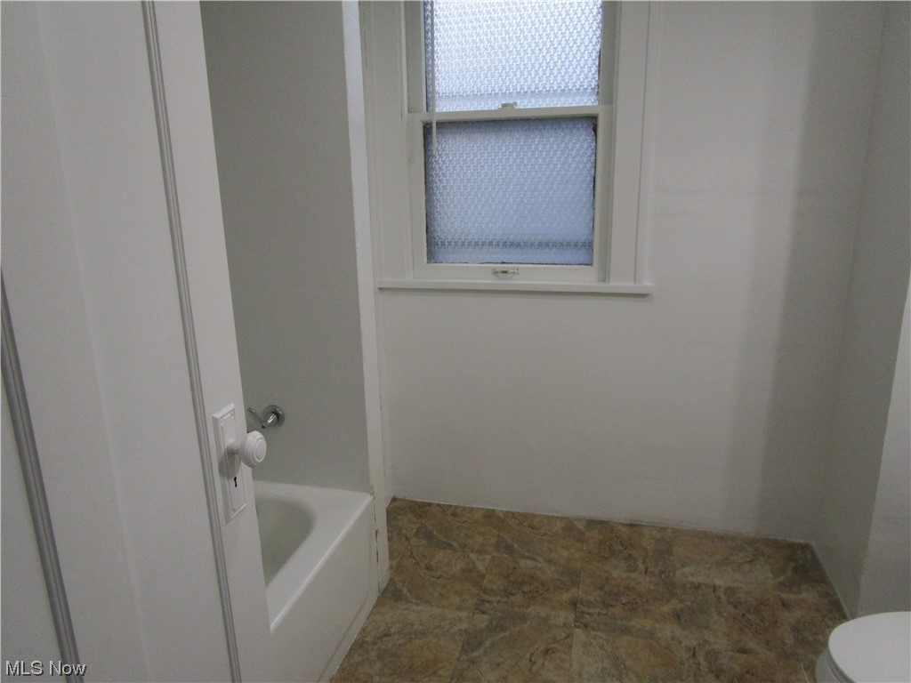 3796 Lowell Road Cleveland Heights, OH 44121 - Photo 10 of 11 Bathroom with tile floors and toilet