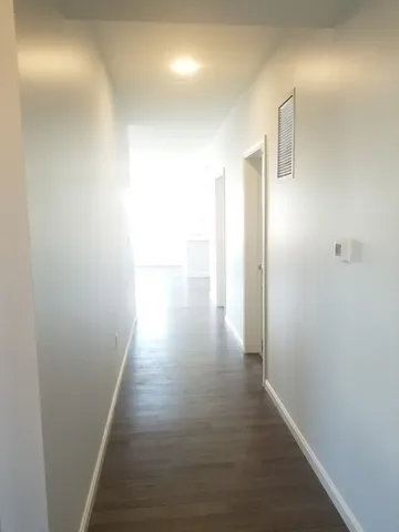 a view of hallway with stairs