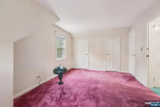 a room with furniture and a window