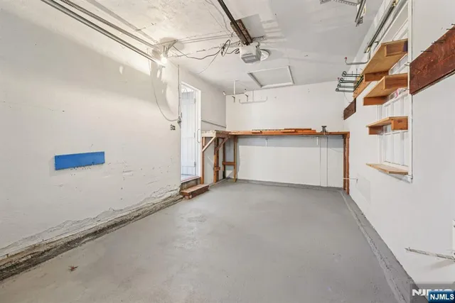 a picture of a bathroom with a shower