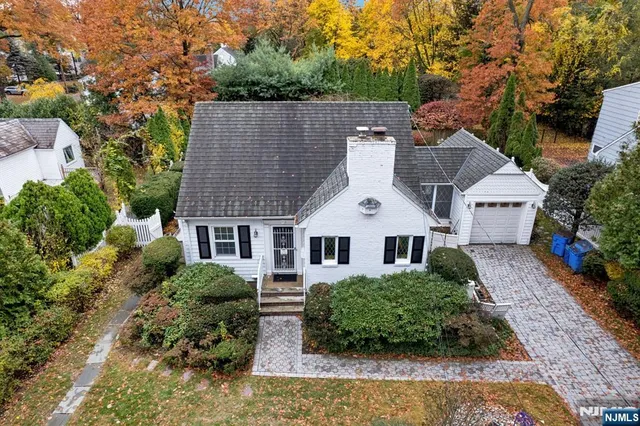 an aerial view of house with yard
