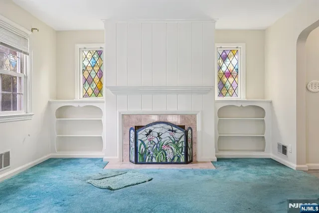 a room with furniture and a window