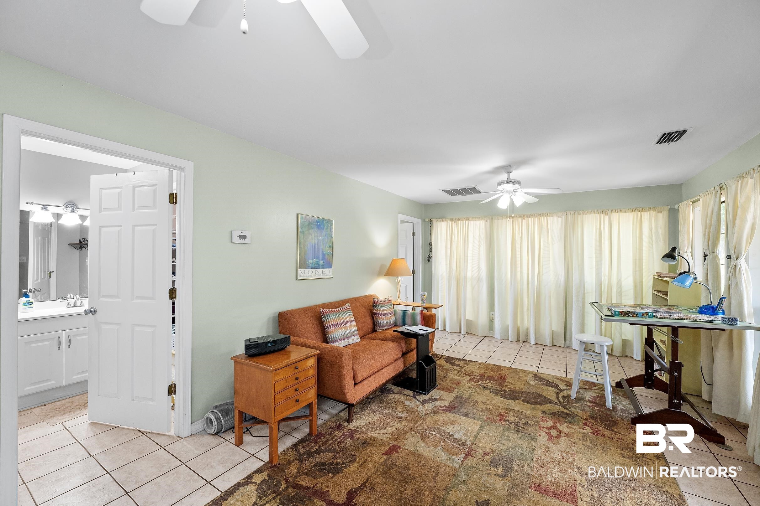 4026 Kingsrow Row Mobile, AL 36619 - Photo 16 of 51 Sitting room with ceiling fan and light tile patterned floors