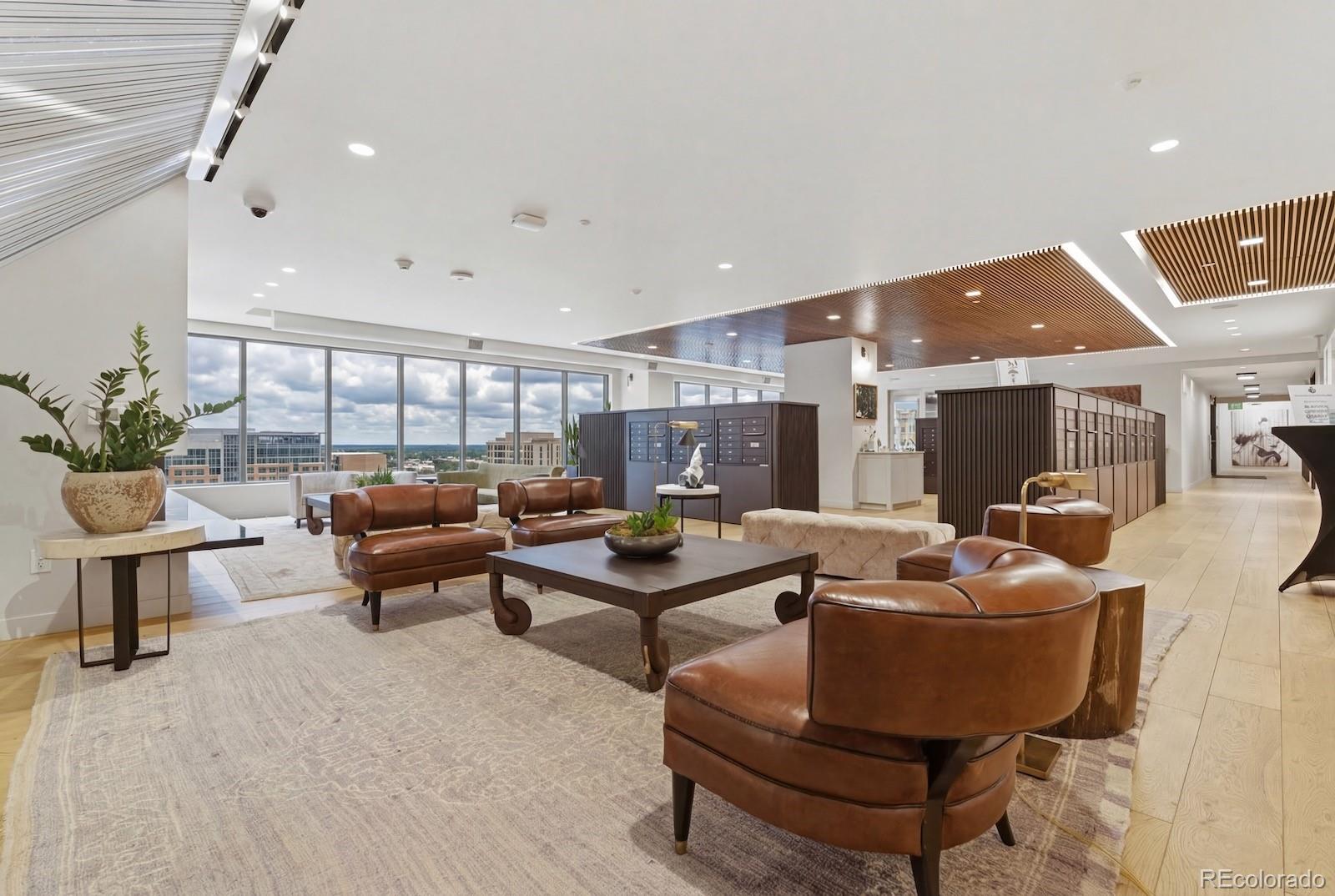 1750 Wewatta Street, Unit 1030 Denver, CO 80202 - Photo 45 of 50 a living room with furniture and a wooden floor