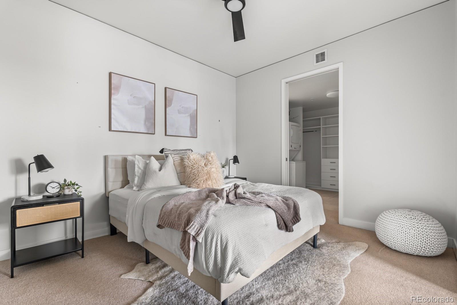 1750 Wewatta Street, Unit 1030 Denver, CO 80202 - Photo 9 of 50 a bedroom with bed and a window