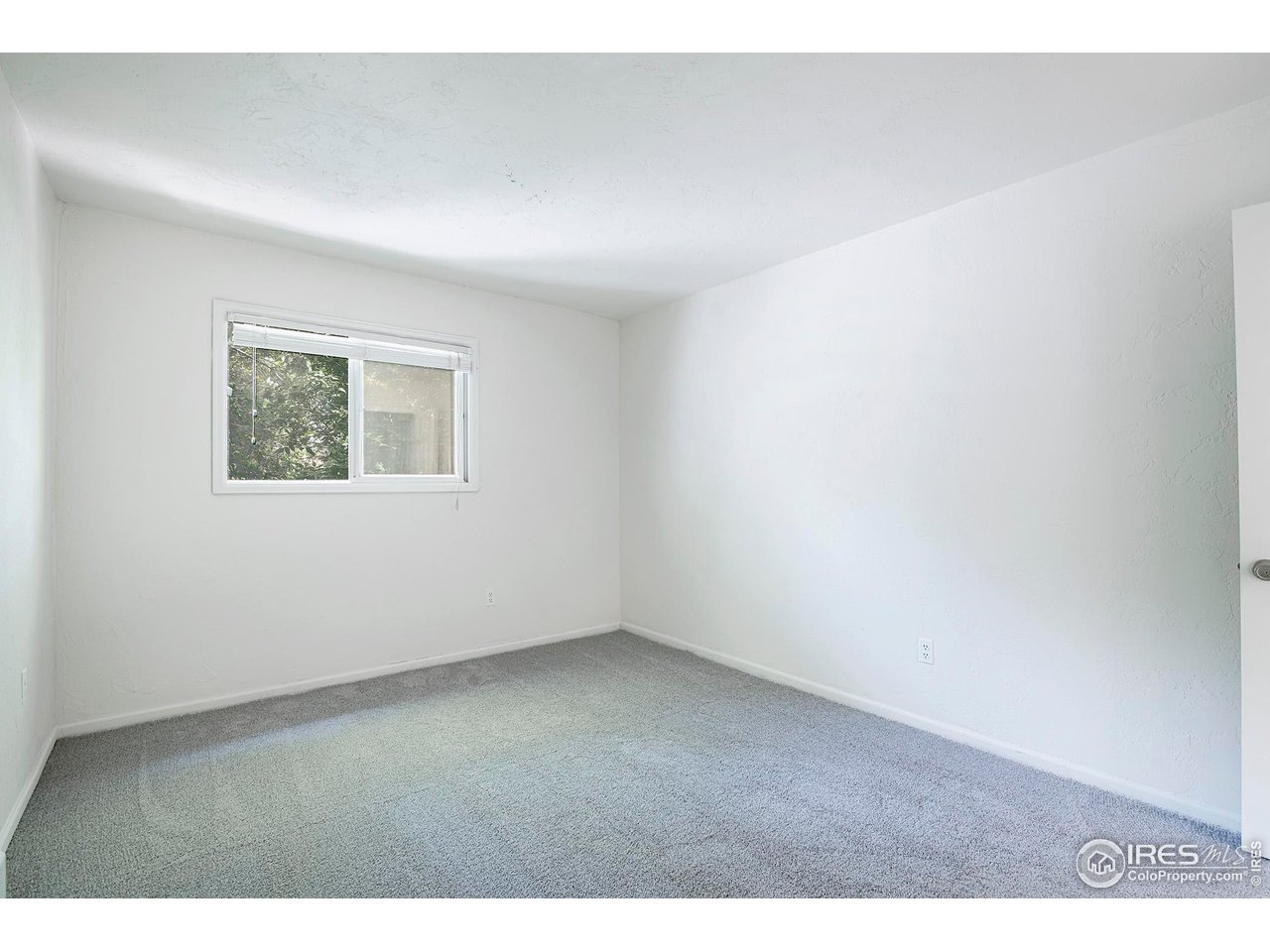 3054 Edison Court Boulder, CO 80301 - Photo 21 of 36 a view of an empty room with a window