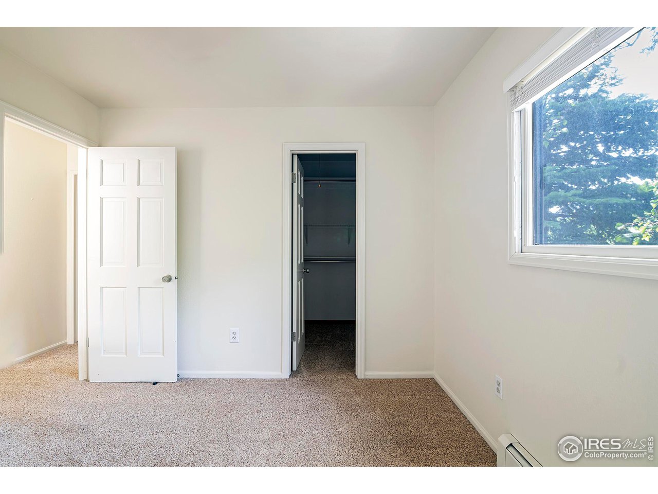 3054 Edison Court Boulder, CO 80301 - Photo 24 of 36 a view of an empty room with a window