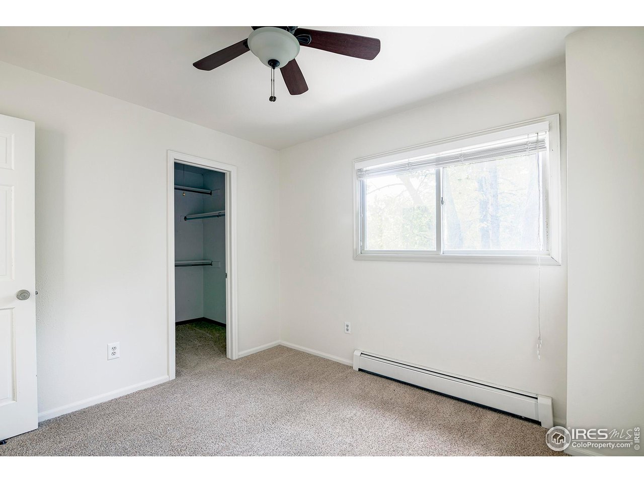 3054 Edison Court Boulder, CO 80301 - Photo 25 of 36 a view of an empty room with a window