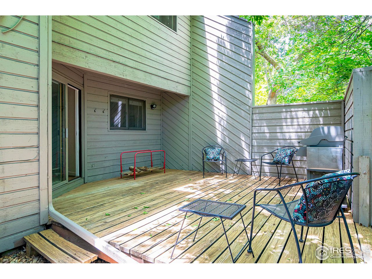 3054 Edison Court Boulder, CO 80301 - Photo 28 of 36 a view of a patio with a table and chairs