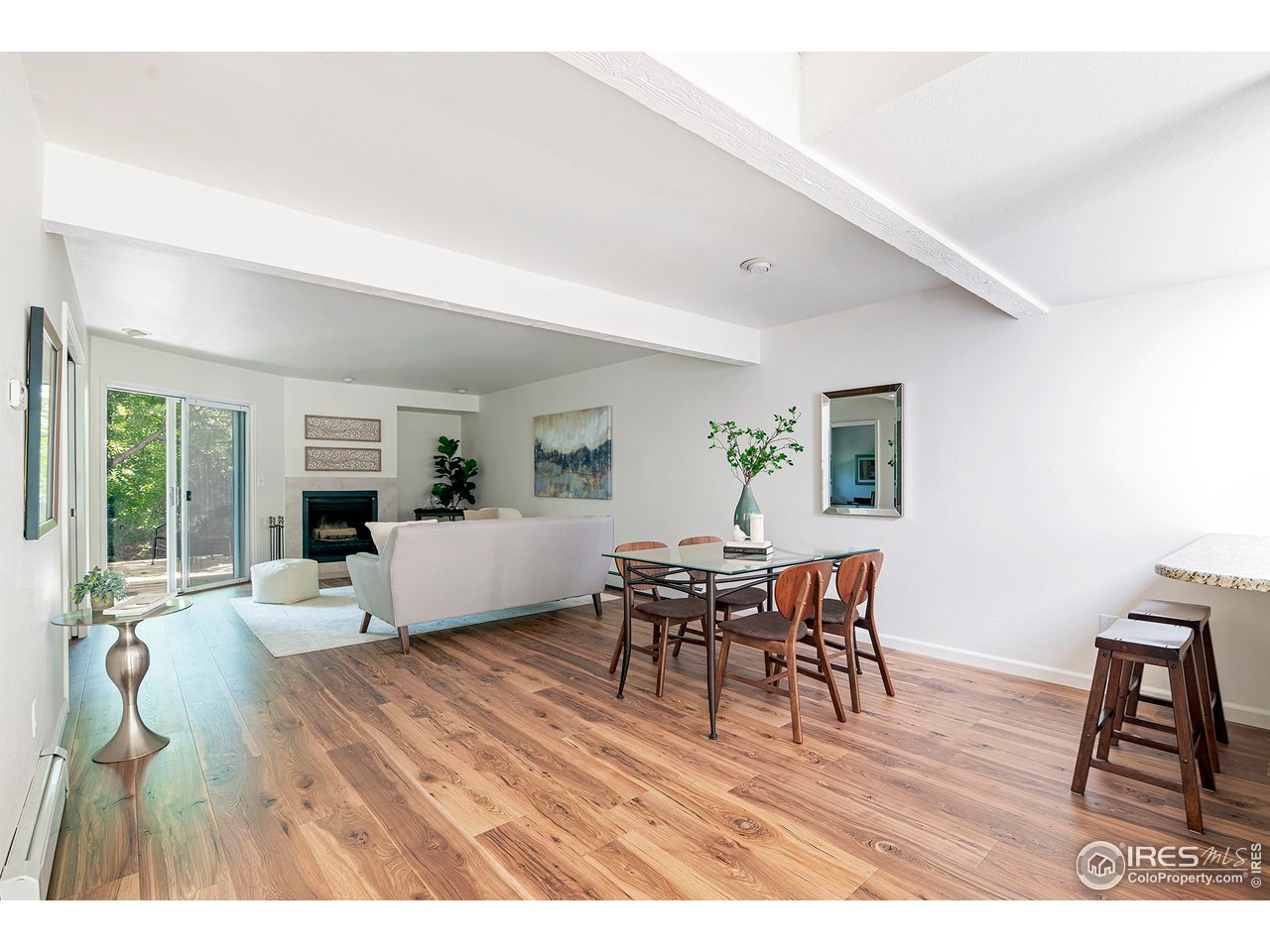 3054 Edison Court Boulder, CO 80301 - Photo 5 of 36 a living room with furniture and a wooden floor