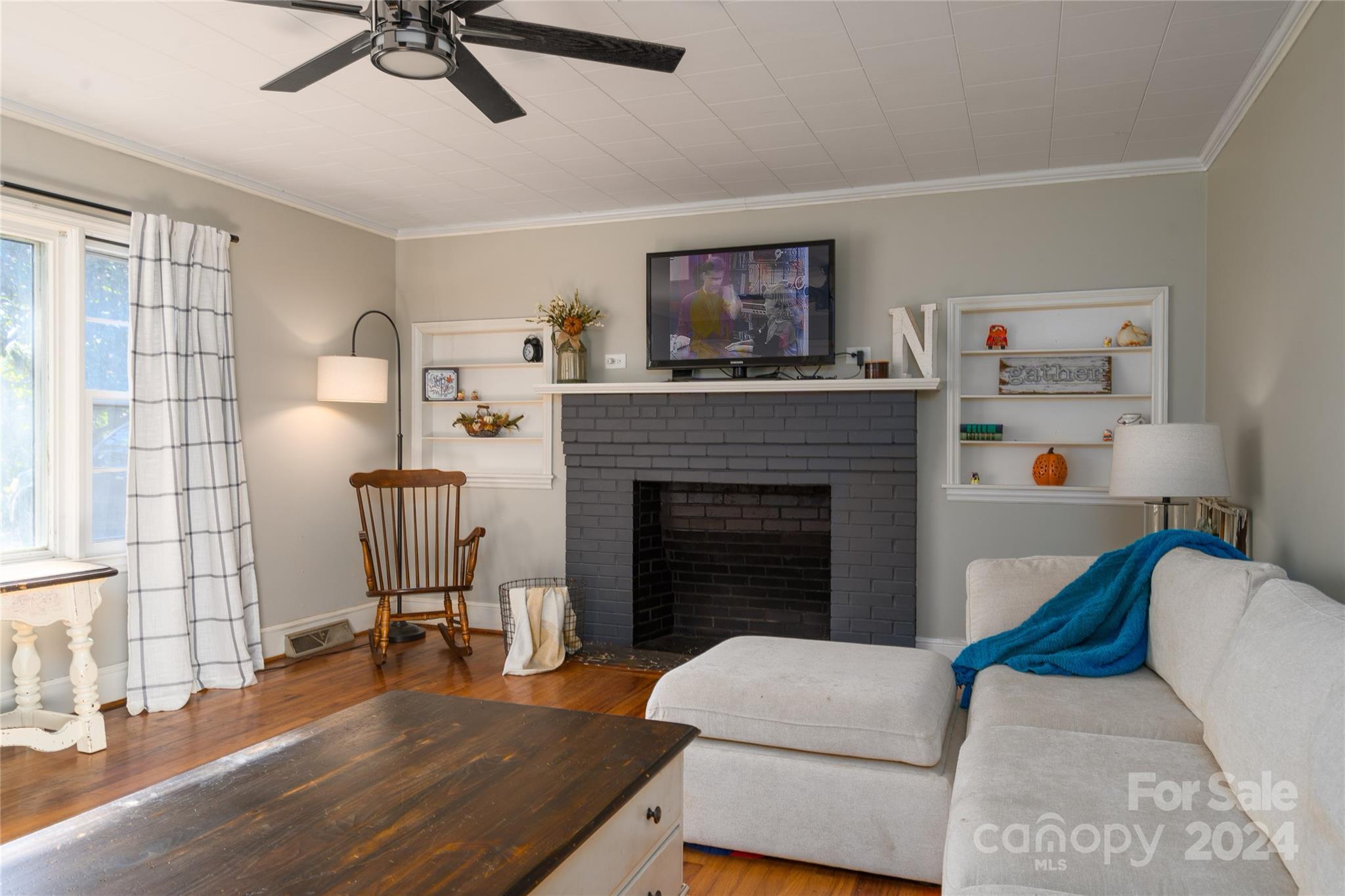2176 Old Hickory Grove Road Mount Holly, NC 28120 - Photo 11 of 34 a living room with furniture and a fireplace
