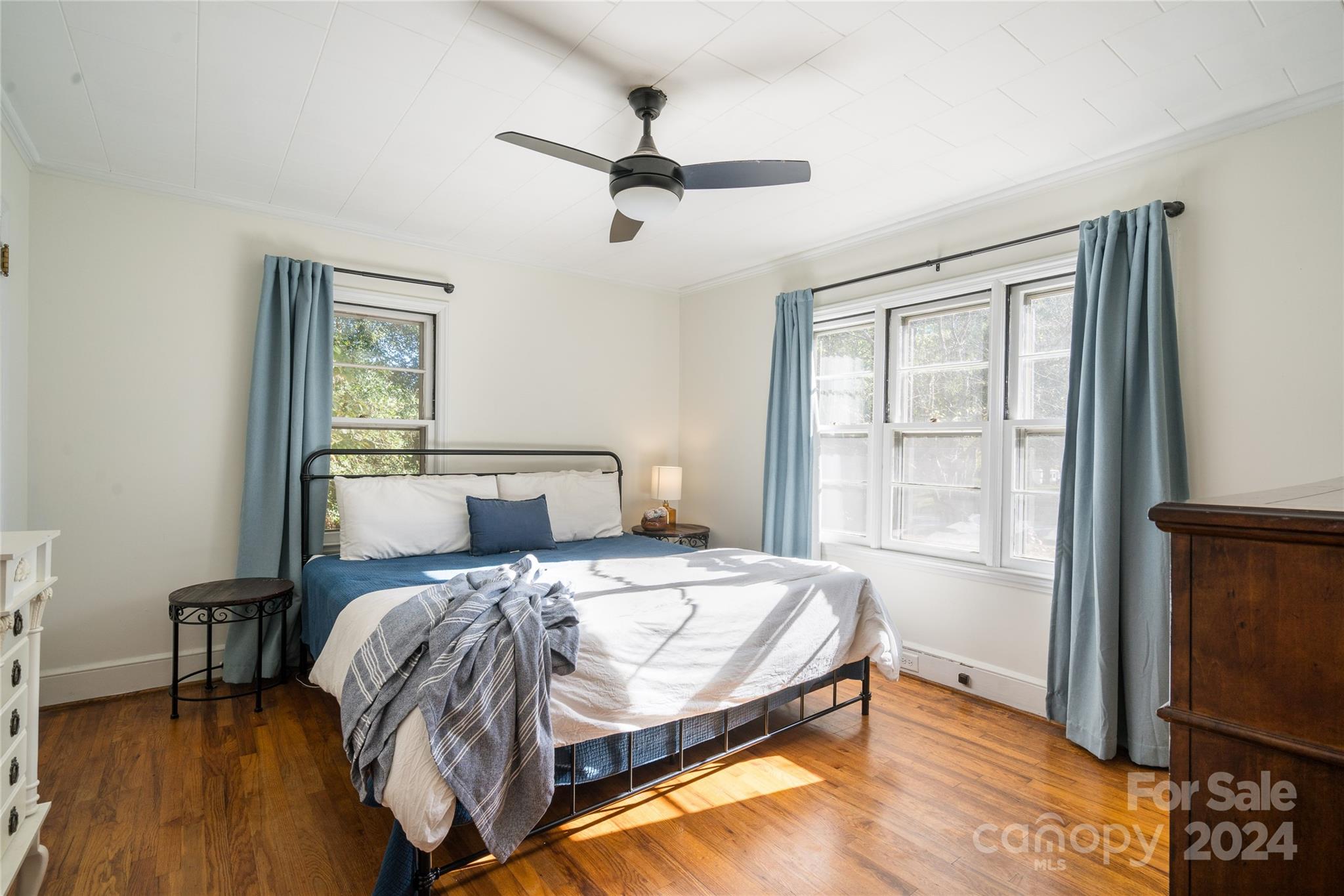 2176 Old Hickory Grove Road Mount Holly, NC 28120 - Photo 20 of 34 a bedroom with a bed and a tv on table