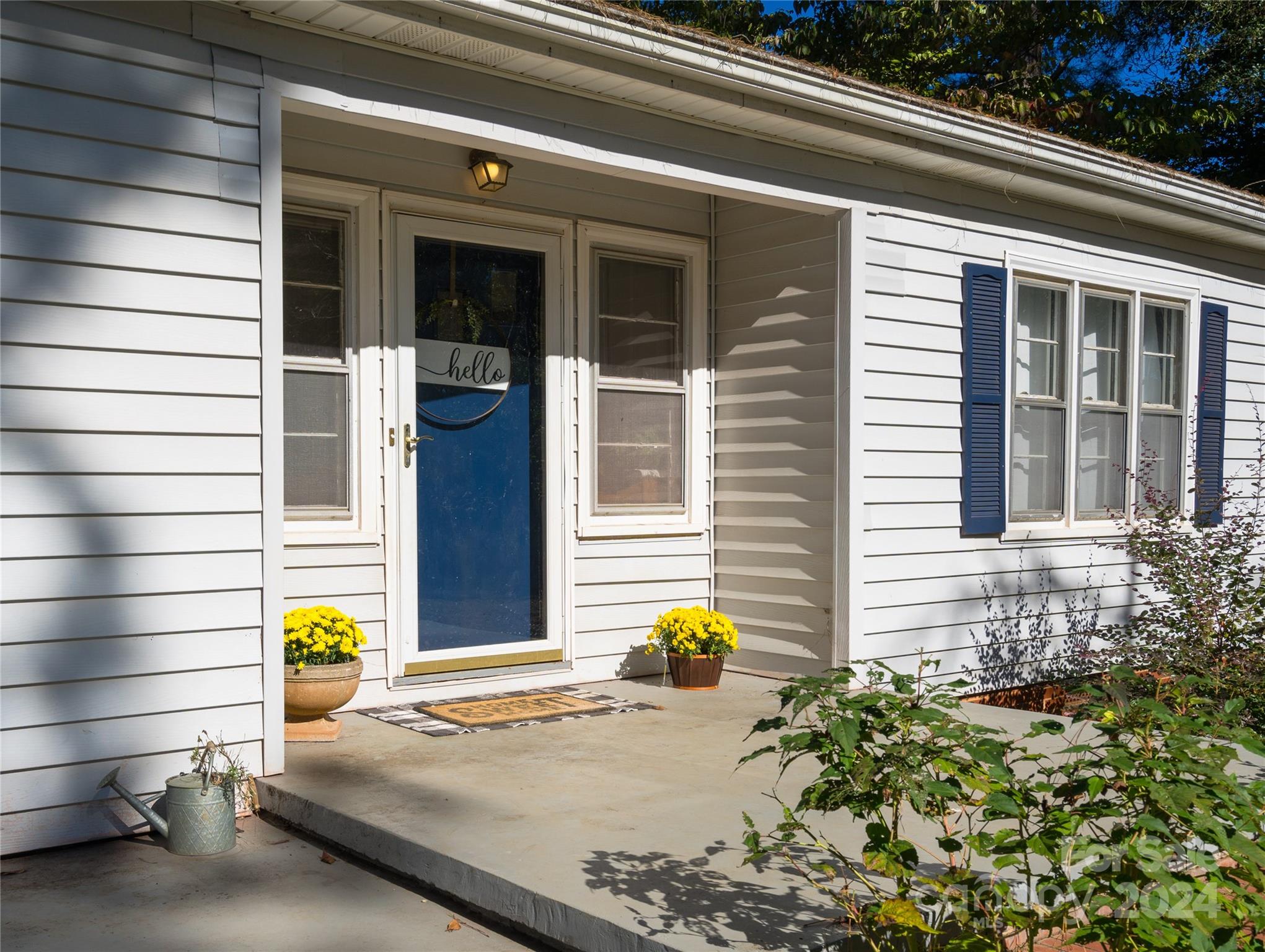 2176 Old Hickory Grove Road Mount Holly, NC 28120 - Photo 2 of 34 a front view of a house with street