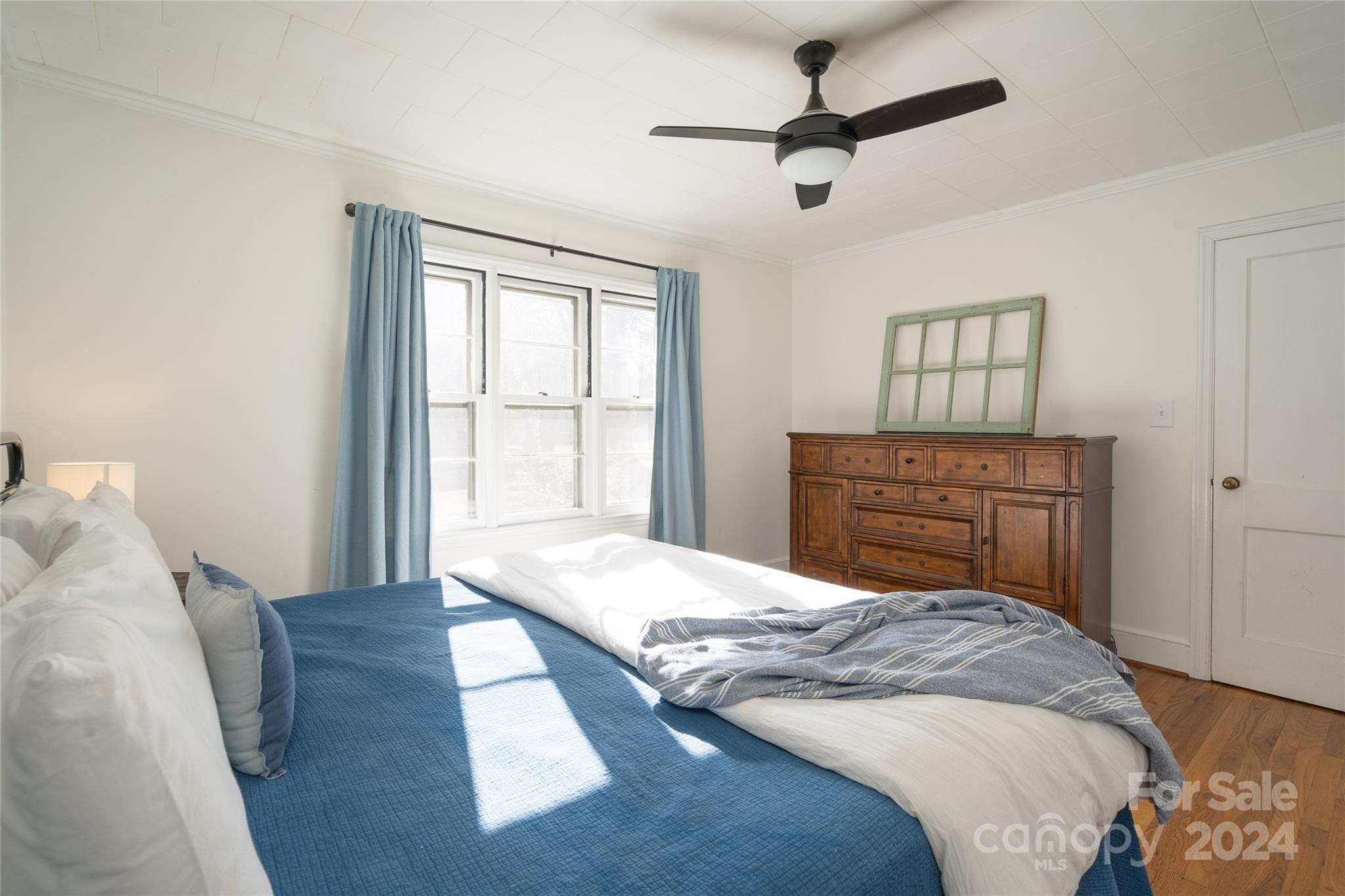 2176 Old Hickory Grove Road Mount Holly, NC 28120 - Photo 21 of 34 a bedroom with a bed and a dresser