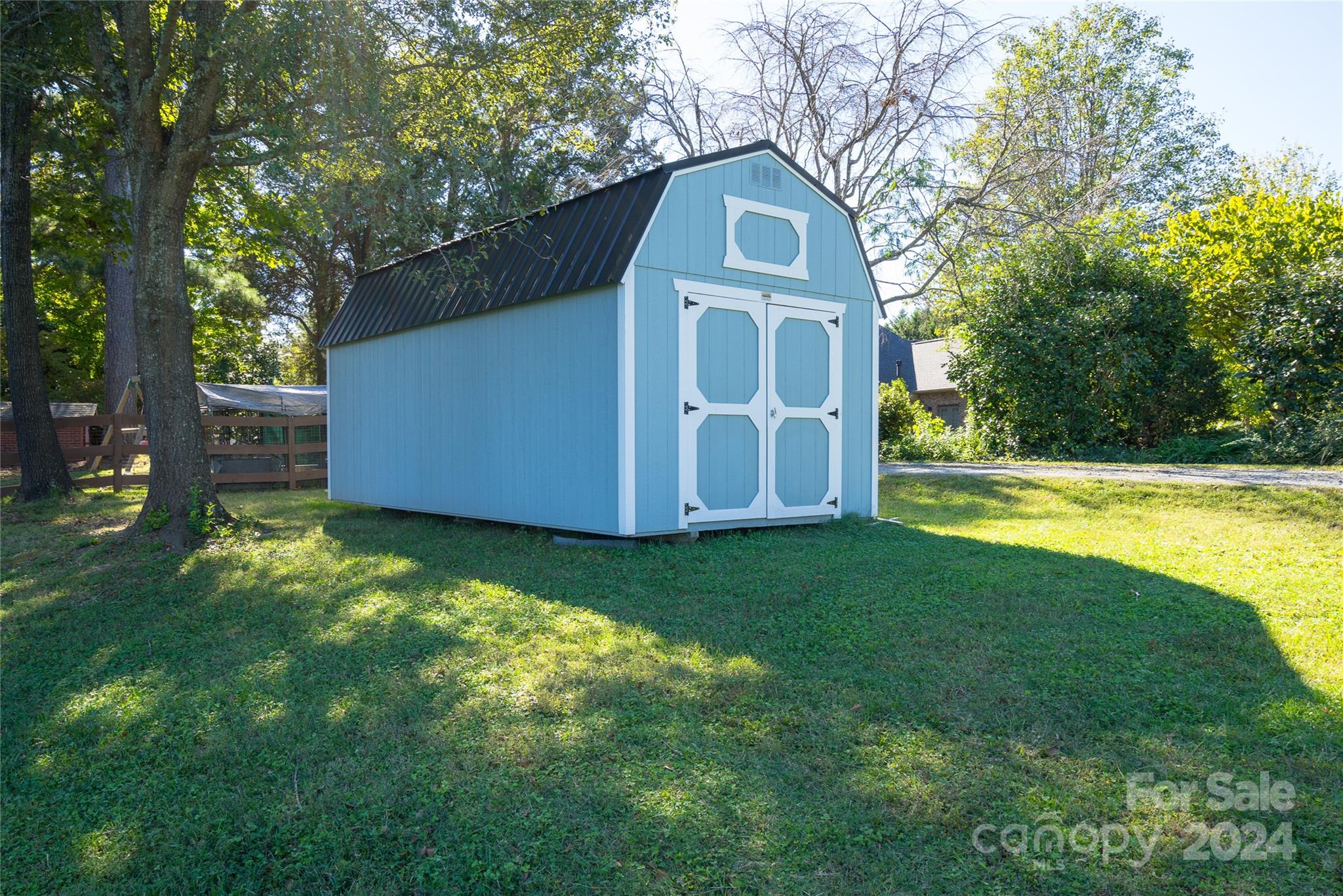 2176 Old Hickory Grove Road Mount Holly, NC 28120 - Photo 32 of 34 a front view of a house with garden