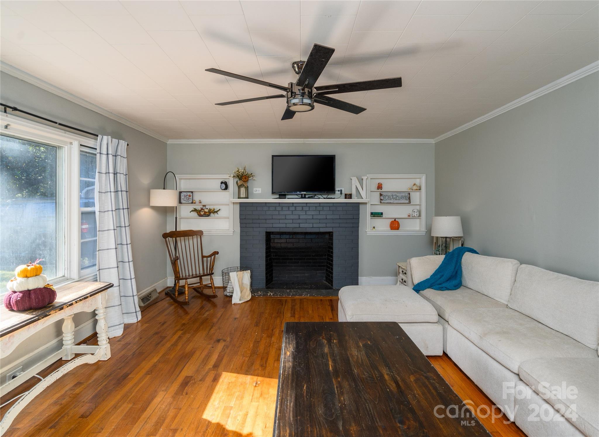 2176 Old Hickory Grove Road Mount Holly, NC 28120 - Photo 9 of 34 a living room with furniture and a fireplace
