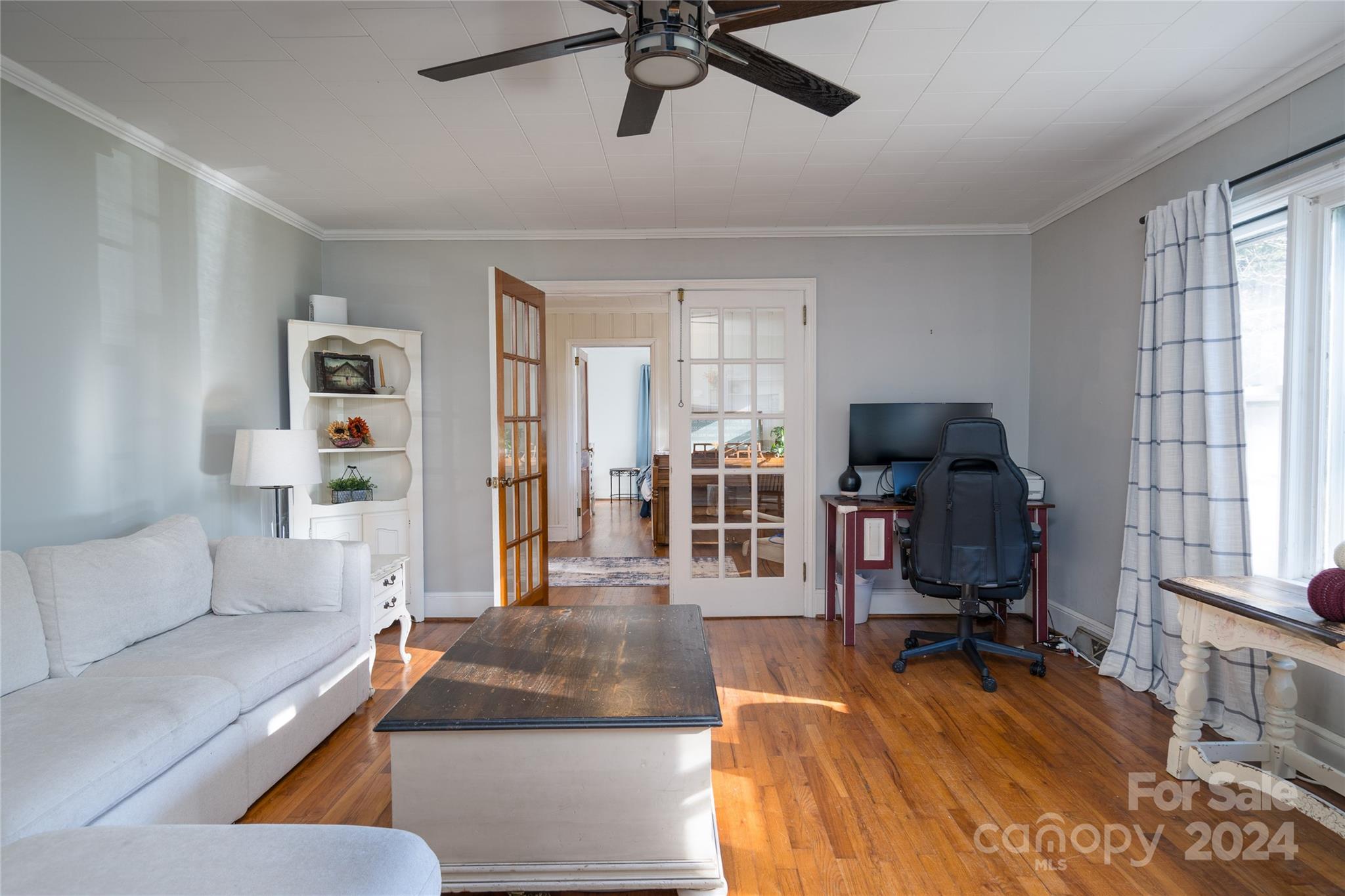 2176 Old Hickory Grove Road Mount Holly, NC 28120 - Photo 10 of 34 a living room with furniture gym equipment and a window