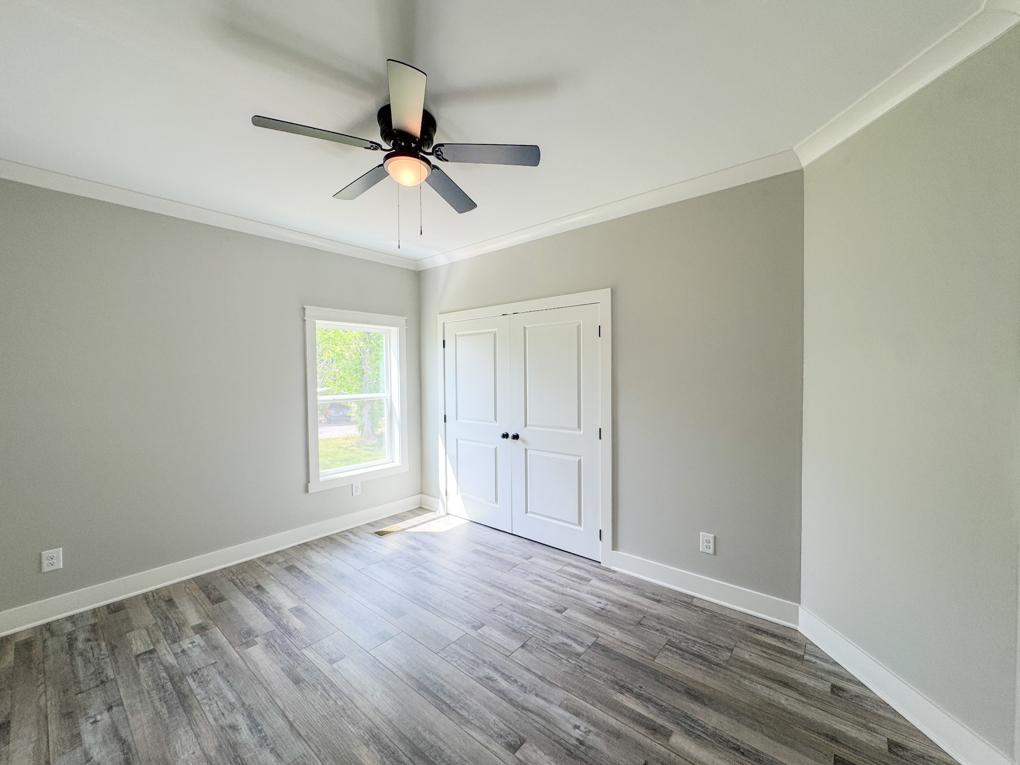 181 Rock House Hollow Road Bethpage, TN 37022 - Photo 35 of 51 wooden floor in an empty room with a window