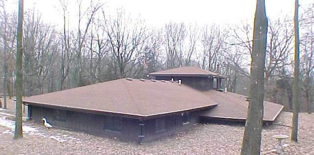 1262 East Brick Road Oregon, IL 61061 - Photo 5 of 6 a view of a backyard with a patio and fire pit