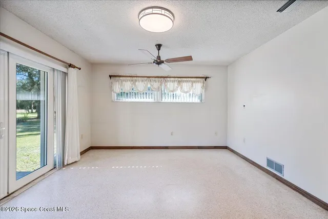 a view of a house with a big yard