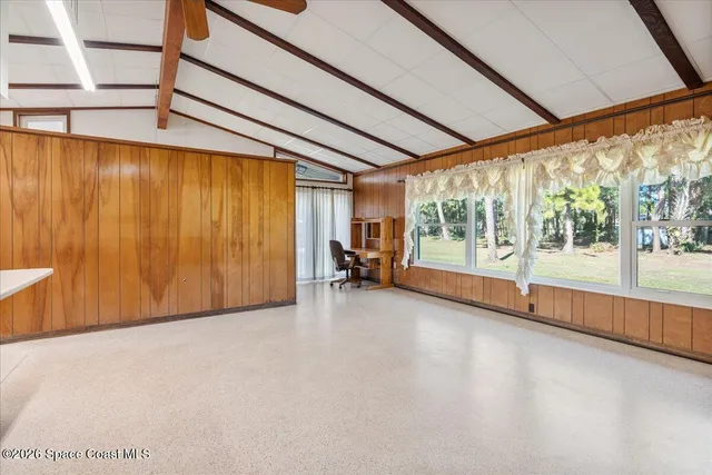 an aerial view of residential house with outdoor space