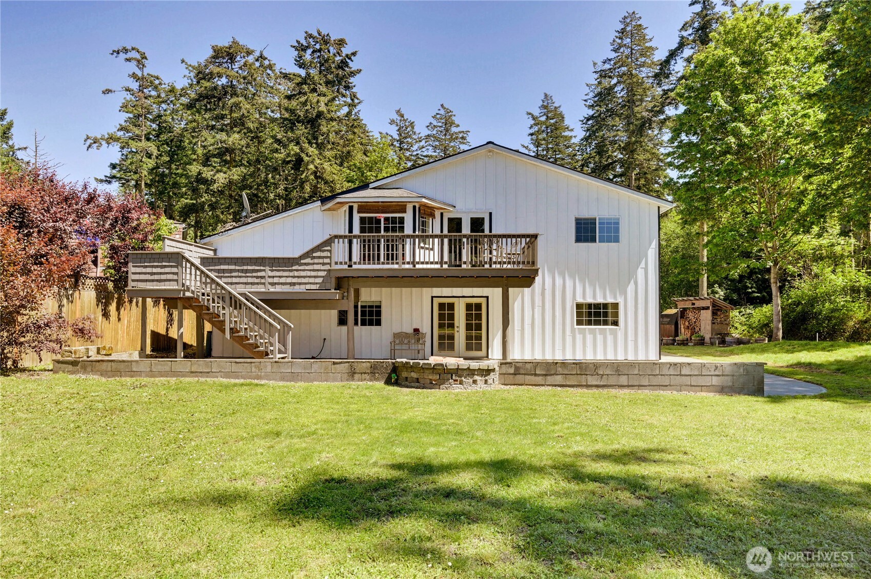 196 Nolton Road Nordland, WA 98358 - Photo 32 of 39 a front view of a house with a yard