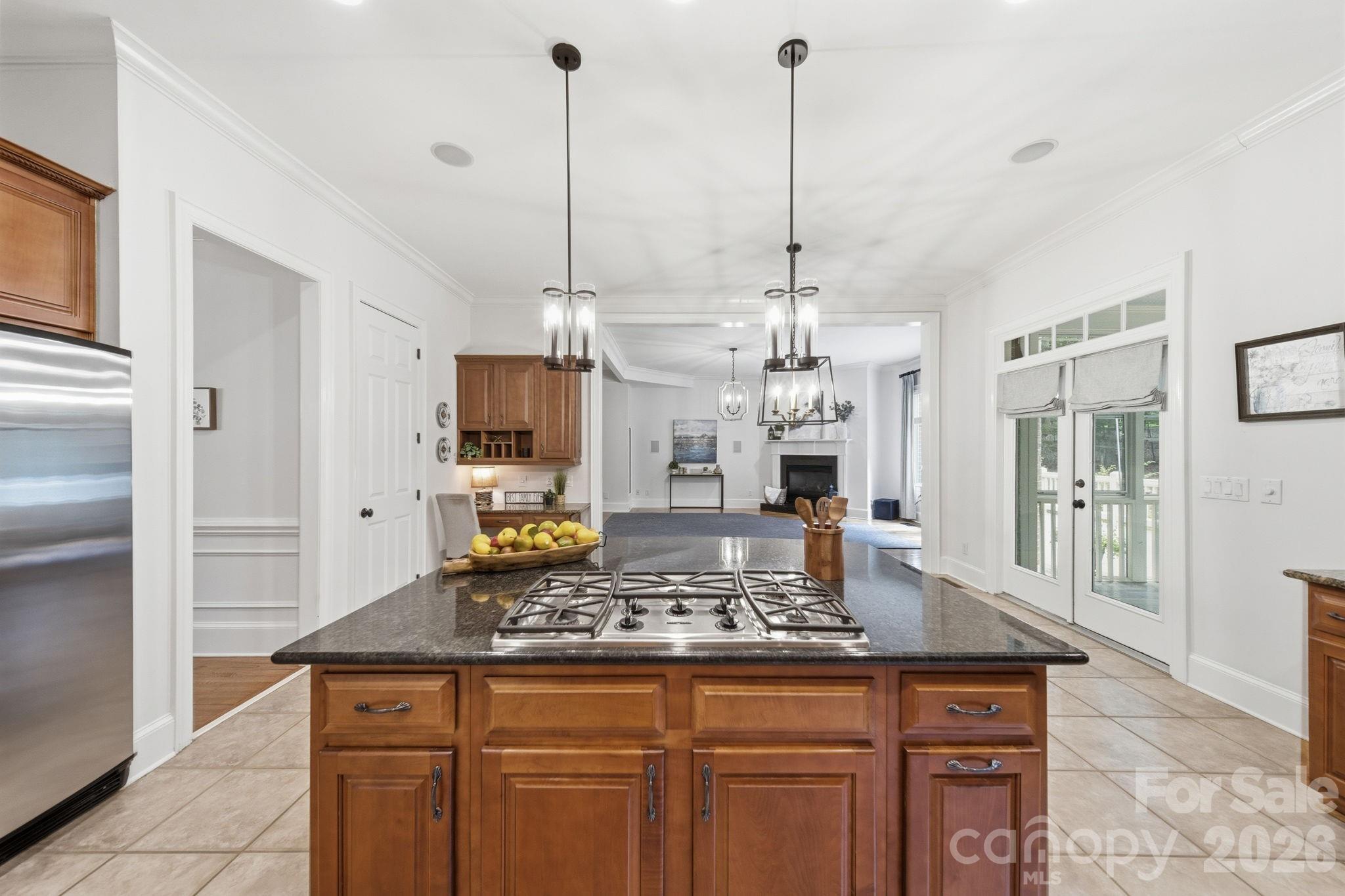 1802 Summit View Place Waxhaw, NC 28173 - Photo 15 of 47 a kitchen with kitchen island granite countertop a counter space and stainless steel appliances