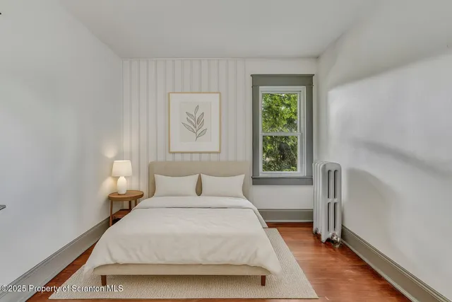 a kitchen with furniture and window