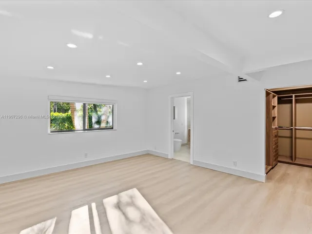 an empty room with window