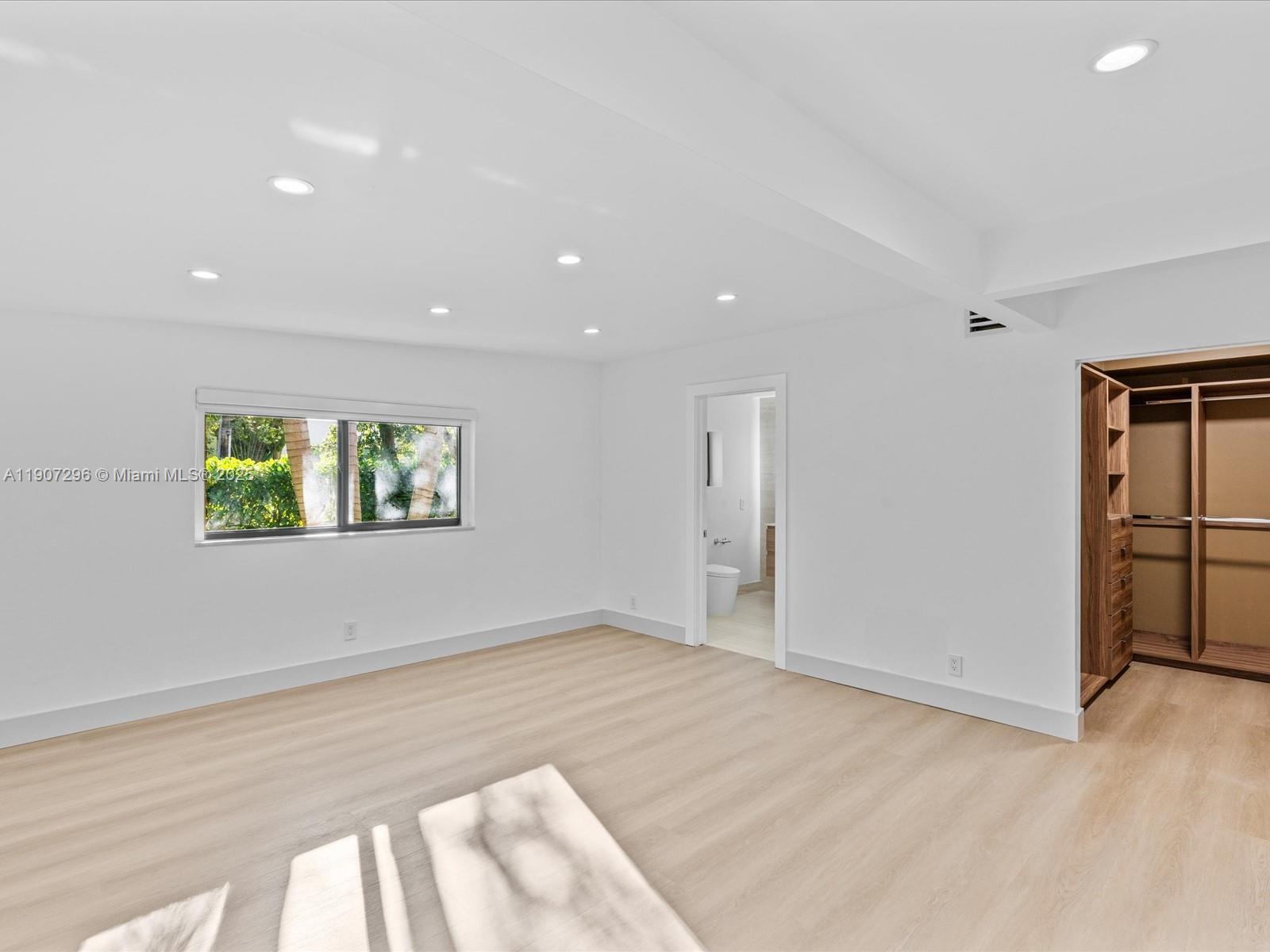 19461 Northeast 22nd Road North Miami Beach, FL 33179 - Photo 16 of 34 an empty room with window