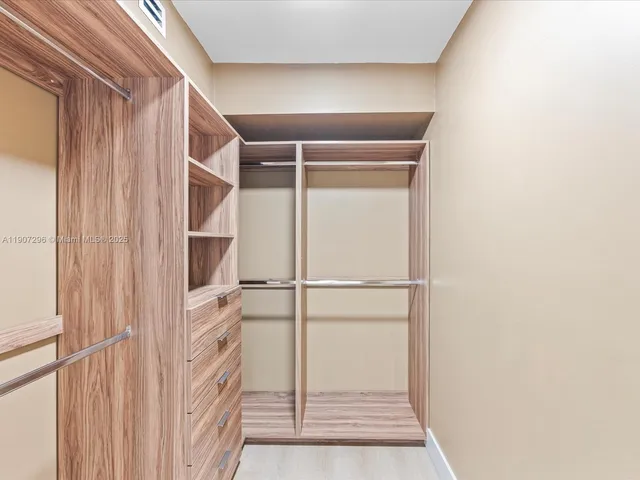 a view of a walk in closet