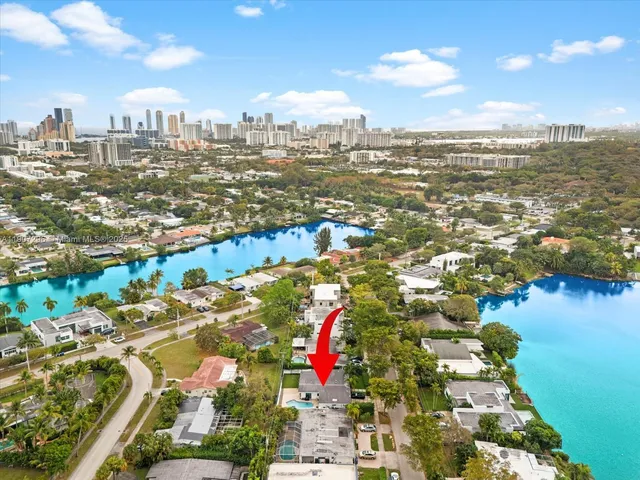 an aerial view of a house with a garden