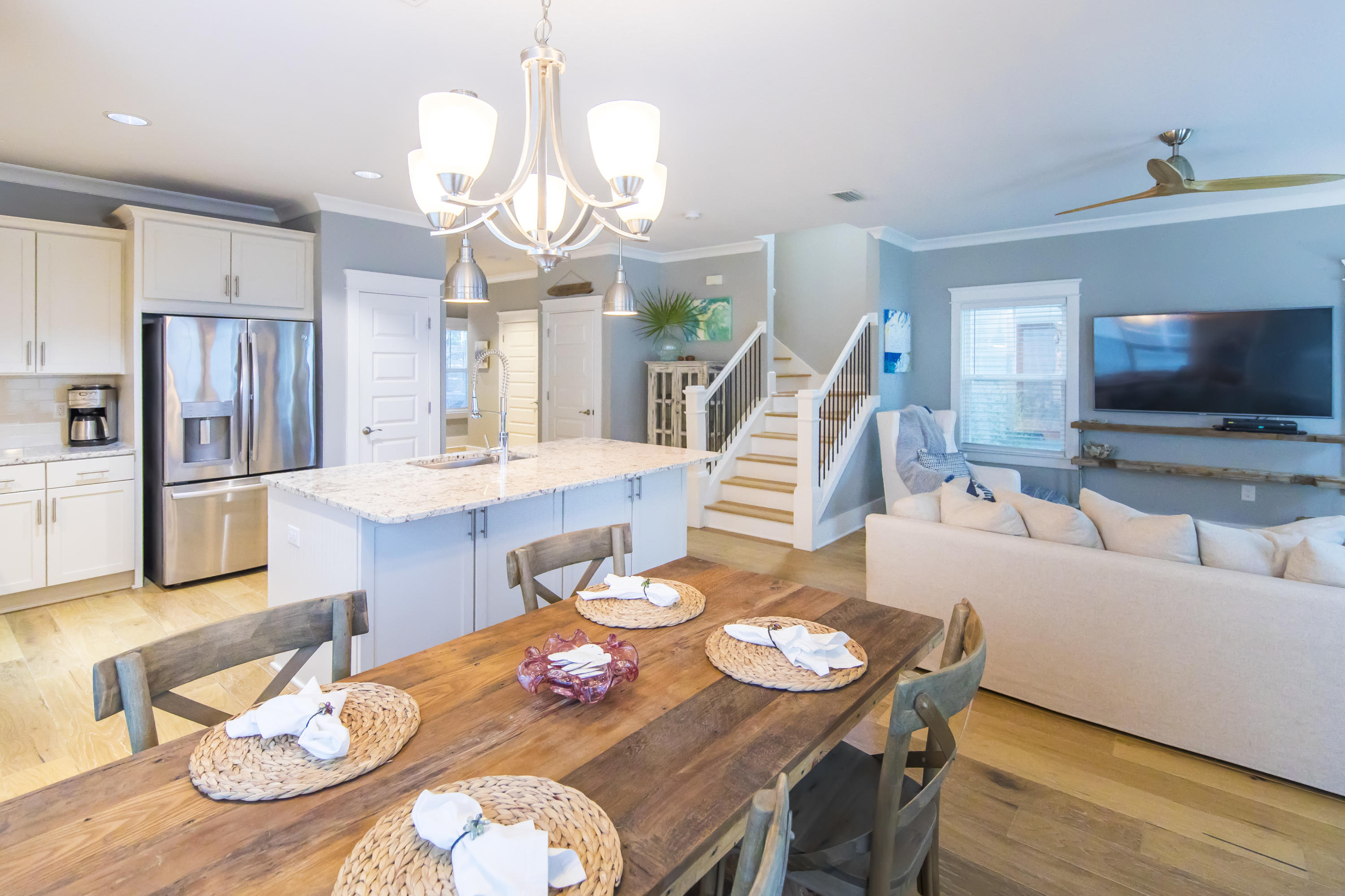 96 Grande Pointe Drive Inlet Beach, FL 32461 - Photo 8 of 35 a view of a dining room with furniture and wooden floor