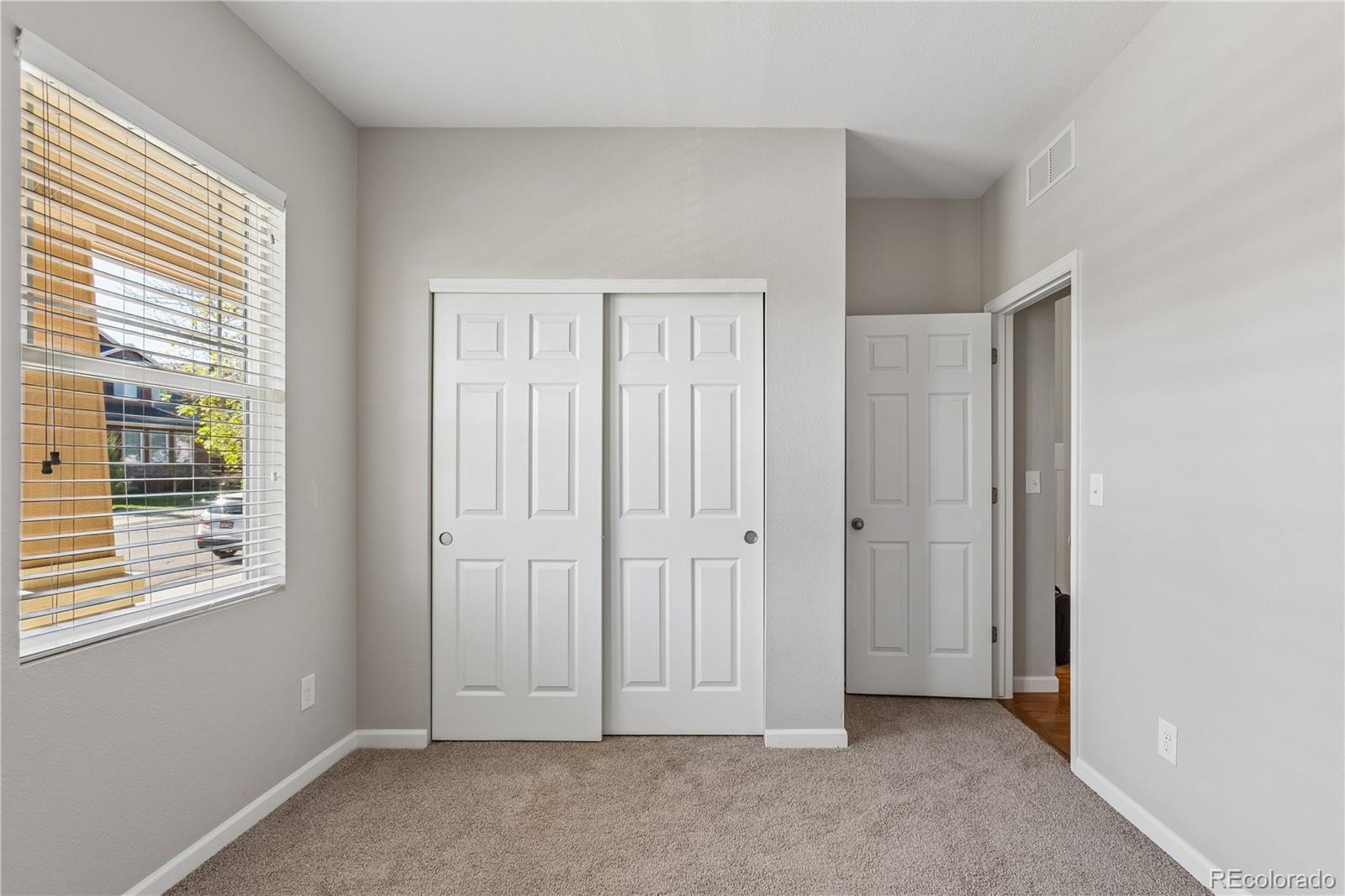 5031 South Rome Street Aurora, CO 80015 - Photo 26 of 39 an empty room with windows